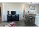 View of open living space showcasing the entertainment center and dining area at 874 Baveno Dr, Venice, FL 34285
