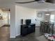 Open-concept living space connecting the kitchen, dining area, and living room at 874 Baveno Dr, Venice, FL 34285