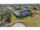 Aerial view of house with solar panels and pool at 1000 Joyce Ct, Venice, FL 34293