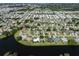 Aerial view of neighborhood near the water at 1226 Pine Needle Rd, Venice, FL 34285