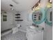 Updated bathroom, featuring a walk-in shower and modern vanity at 1226 Pine Needle Rd, Venice, FL 34285