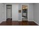 Bedroom with access to bathroom and large closet at 1226 Pine Needle Rd, Venice, FL 34285