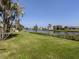 Peaceful view of the canal from the backyard at 1226 Pine Needle Rd, Venice, FL 34285