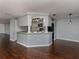 Modern kitchen with stainless steel appliances and breakfast bar at 1226 Pine Needle Rd, Venice, FL 34285