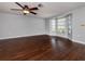 Bright living room with hardwood floors and ceiling fan at 1226 Pine Needle Rd, Venice, FL 34285