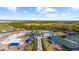 Aerial view of community pool and courts at 12280 Wellen Golf St # 108, Venice, FL 34293