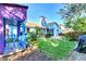 Spacious backyard with playhouse and grassy area at 1237 Schooner Ln, Venice, FL 34285
