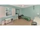 Light and airy bedroom with a single bed and a view of the backyard at 1237 Schooner Ln, Venice, FL 34285