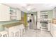 Updated kitchen featuring granite countertops and white cabinets at 1237 Schooner Ln, Venice, FL 34285