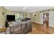 Spacious living area featuring a barn door and comfortable seating at 1237 Schooner Ln, Venice, FL 34285