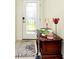 Entryway with decorative rug, console table, and elegant door at 12385 Amica Loop, Venice, FL 34293