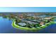 Tennis courts with lake and community view at 13756 Vadini St, Venice, FL 34293