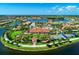 Community clubhouse with pool and park area at 13756 Vadini St, Venice, FL 34293