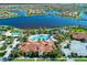 Resort-style community pool, clubhouse, and tennis courts at 13756 Vadini St, Venice, FL 34293