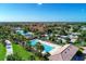 Resort-style pool and lap pool with lush landscaping at 13756 Vadini St, Venice, FL 34293