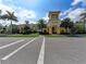 Community clubhouse with palm trees and landscaping at 13756 Vadini St, Venice, FL 34293