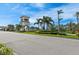 Ornate entrance to the community with landscaping at 13756 Vadini St, Venice, FL 34293