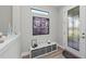 Bright and airy entryway with decorative storage at 13756 Vadini St, Venice, FL 34293