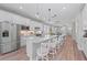 Well-equipped kitchen featuring stainless steel appliances and white cabinetry at 13756 Vadini St, Venice, FL 34293