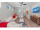 Spacious living area featuring hardwood floors and a neutral color palette at 13756 Vadini St, Venice, FL 34293