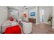 Living room showcasing hardwood floors, comfortable seating and a modern aesthetic at 13756 Vadini St, Venice, FL 34293