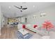 Light and airy living room with hardwood floors and stylish furnishings at 13756 Vadini St, Venice, FL 34293