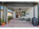 Relaxing screened patio with comfortable seating and outdoor grill at 13756 Vadini St, Venice, FL 34293