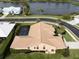 Aerial view showing house, pool, and surrounding area at 1579 Waterford Dr, Venice, FL 34292
