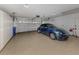 Attached garage with storage cabinets and space for one car at 1579 Waterford Dr, Venice, FL 34292