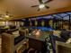 Enjoy evenings by the pool and fire pit in this relaxing outdoor space at 1579 Waterford Dr, Venice, FL 34292
