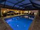 Inviting pool with covered patio at 1579 Waterford Dr, Venice, FL 34292