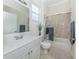 Clean bathroom with white vanity, shower/tub combo, and tile flooring at 1634 Monarch Dr # 1634, Venice, FL 34293