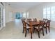 Dining room with hardwood table and chairs, view of Gathering room at 1634 Monarch Dr # 1634, Venice, FL 34293