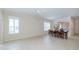 Dining area with table and chairs, view of kitchen at 1634 Monarch Dr # 1634, Venice, FL 34293
