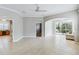 Open Gathering room with tiled floor and access to other rooms at 1634 Monarch Dr # 1634, Venice, FL 34293