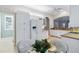 Kitchen with white cabinets, granite counters and breakfast nook at 1634 Monarch Dr # 1634, Venice, FL 34293
