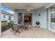 Spacious screened porch with seating area and access to the living room at 1634 Monarch Dr # 1634, Venice, FL 34293