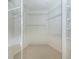 Large walk-in closet with ample shelving and hanging space at 1634 Monarch Dr # 1634, Venice, FL 34293