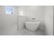 Bathroom features a freestanding bathtub and a walk-in shower at 18055 Dublin Ave, Port Charlotte, FL 33948