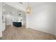 Light and airy dining area with modern light fixture at 18055 Dublin Ave, Port Charlotte, FL 33948