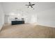 Bright living room with tile floors and access to backyard at 18055 Dublin Ave, Port Charlotte, FL 33948