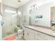 Bathroom boasts double sinks, granite countertop, and a walk-in shower at 18891 Lanuvio St, Venice, FL 34293