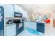 Modern kitchen with stainless steel appliances and granite countertops at 18891 Lanuvio St, Venice, FL 34293