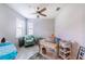 Bright home office features a desk and comfortable chair at 18891 Lanuvio St, Venice, FL 34293