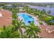 Resort-style pool with lounge chairs and surrounding landscaping at 18891 Lanuvio St, Venice, FL 34293