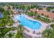 Community pool with plenty of lounge chairs at 18891 Lanuvio St, Venice, FL 34293