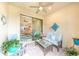 Inviting outdoor patio with seating and view of the backyard at 18891 Lanuvio St, Venice, FL 34293