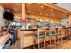 Well-stocked bar with wooden details at 1890 San Trovaso Way, Venice, FL 34285