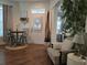 Inviting entryway with a charming seating area at 1890 San Trovaso Way, Venice, FL 34285