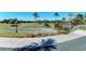 Landscaped walking path alongside the golf course at 1890 San Trovaso Way, Venice, FL 34285